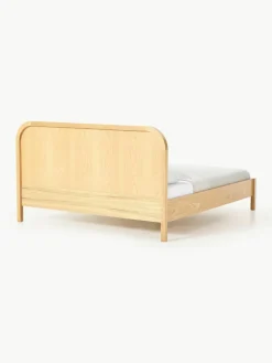 Houten bed Jones met hoofdeinde van bouclé^Westwing Collection Outlet