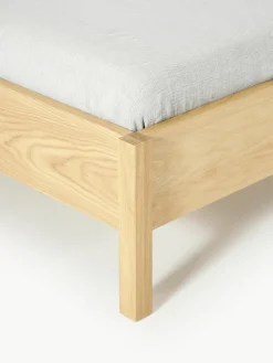 Houten bed Jones met hoofdeinde van bouclé^Westwing Collection Outlet