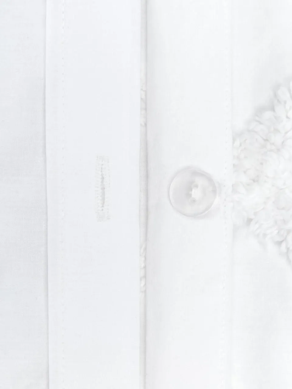 Katoenen perkale kussenhoes Faith met getufte decoratie^Westwing Collection Hot
