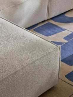 Modulaire bank Lennon (4-zits) uit bouclé met poef (links/rechts)^Westwing Collection Fashion