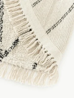 Rond katoenen vloerkleed Bina met ruitjesmotief, handgetuft^Westwing Collection Online